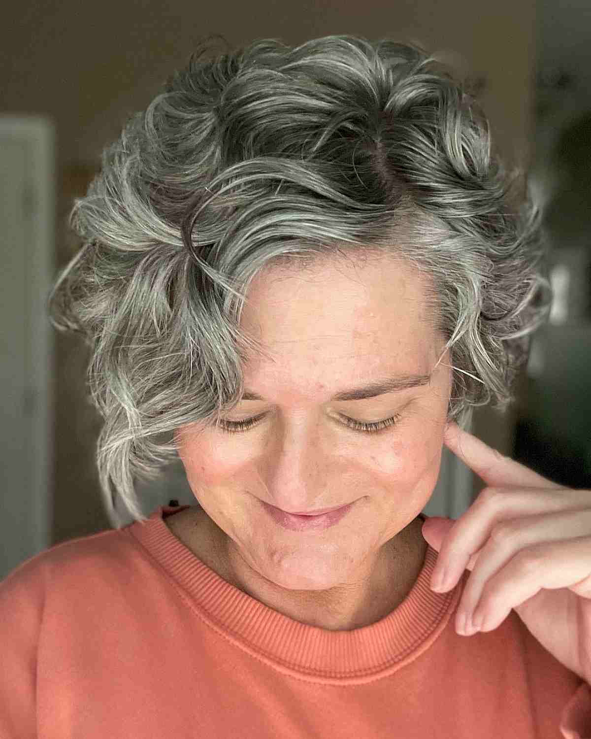 Side-Parted Wavy Pixie Bob on Silver Haired Women Over 50