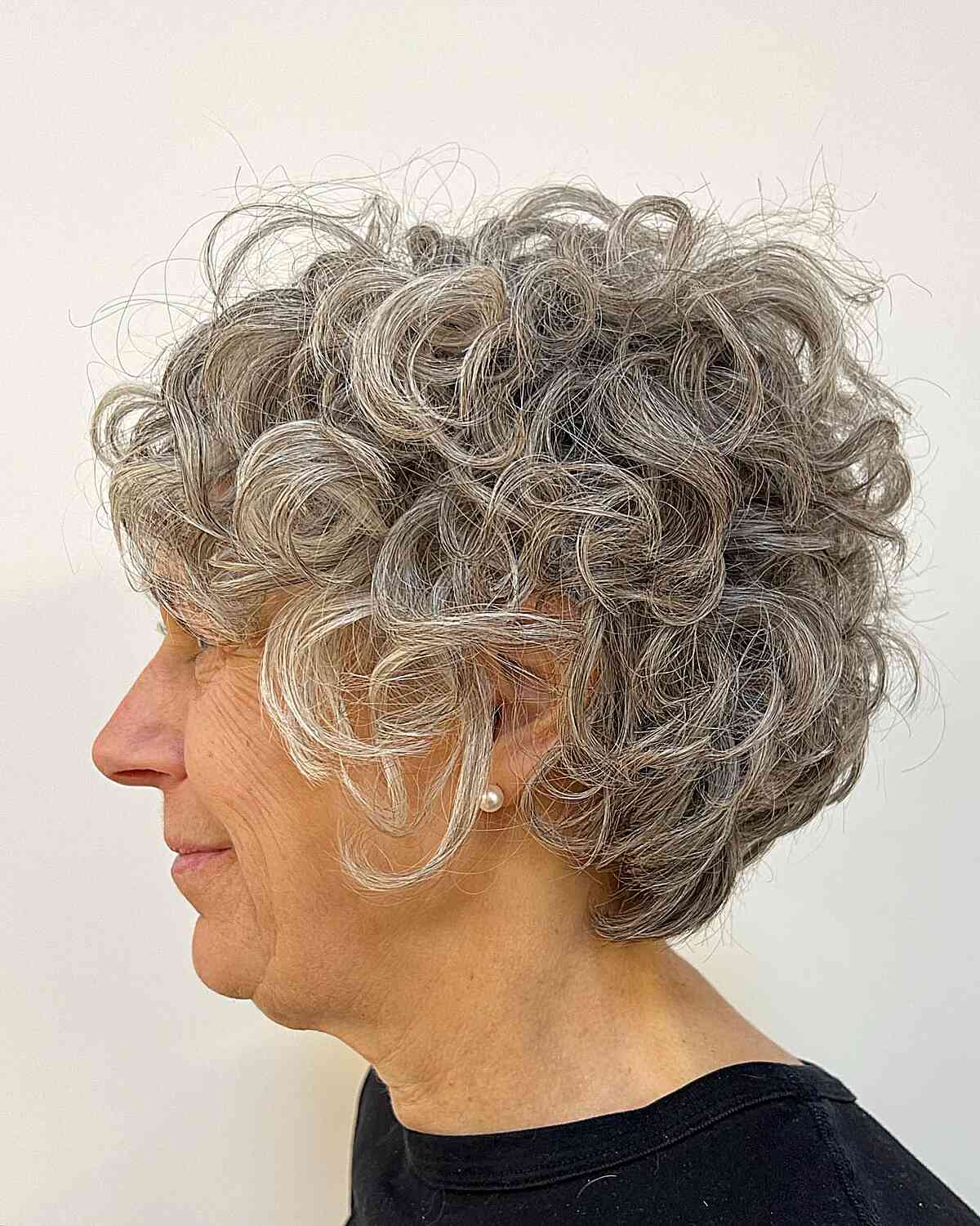 Silver Waves and Elegant Pearls for Women Aged 60 with Short Hair
