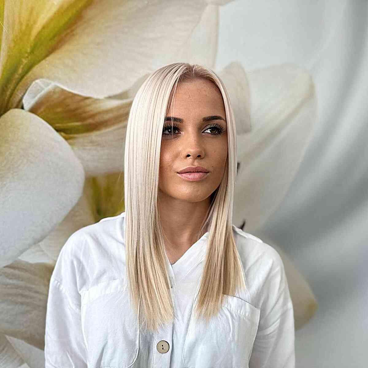 Sleek and Straight Hairstyle for Mid-Length Hair and for women with platinum blonde hair
