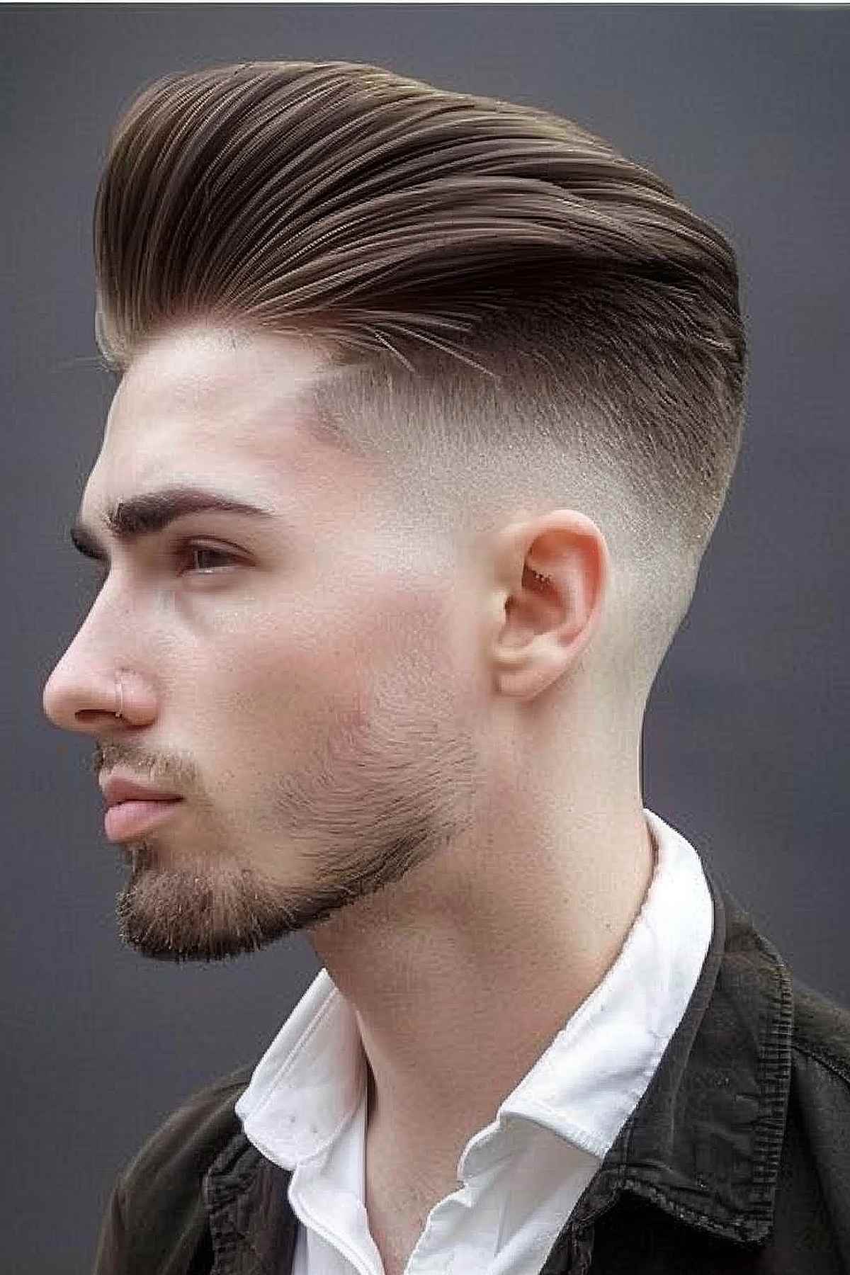 Low bald fade on sleek back long hair