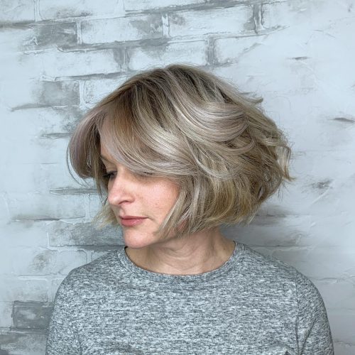 Sleek Blunt Bob with Elegant Side-Swept Bangs