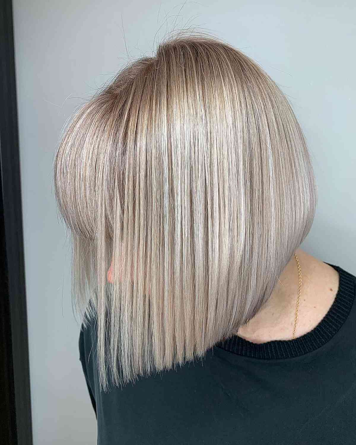 Sleek Bob with Full Bangs for a 50-Year-Old with Fine Hair