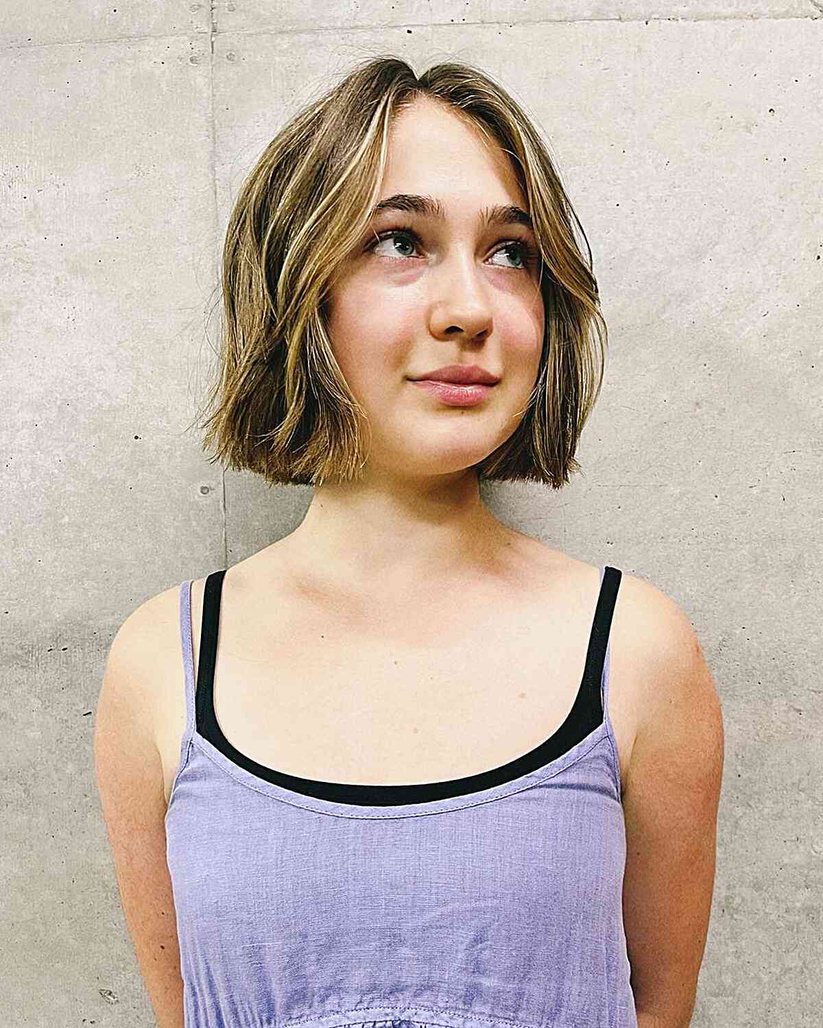 Chin-Length Sleek Boyfriend Bob with a Middle part