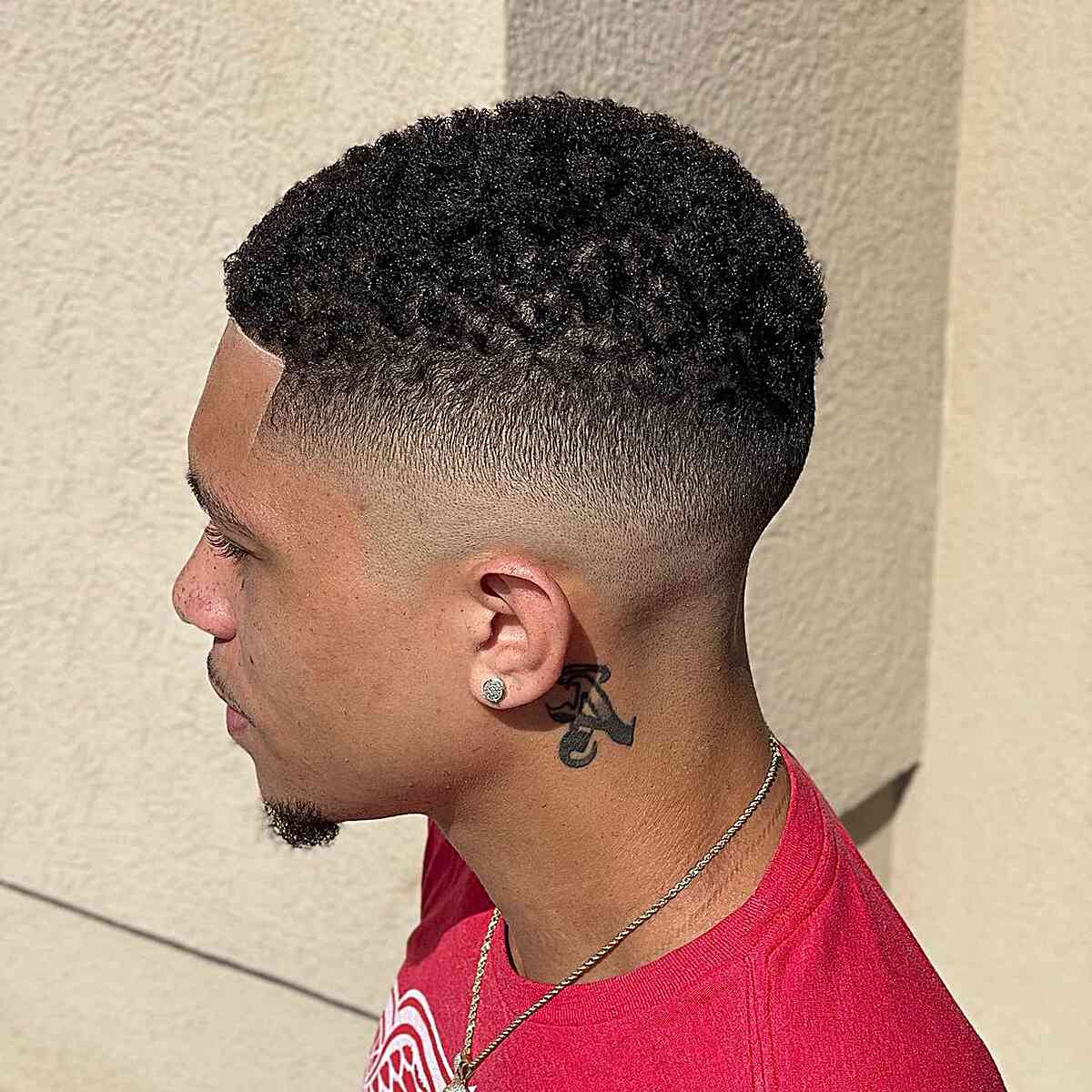 Sleek Line Up and Bald Fade Hairstyle for Men with Thick Hair