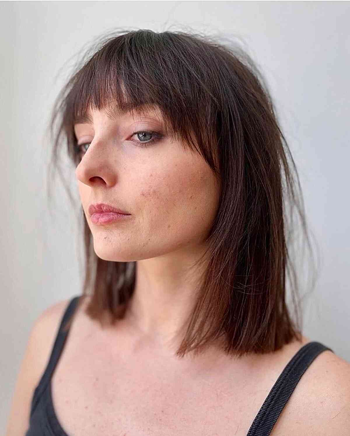 Textured Sleek Lob with Layers and Fringe for Fine Hair