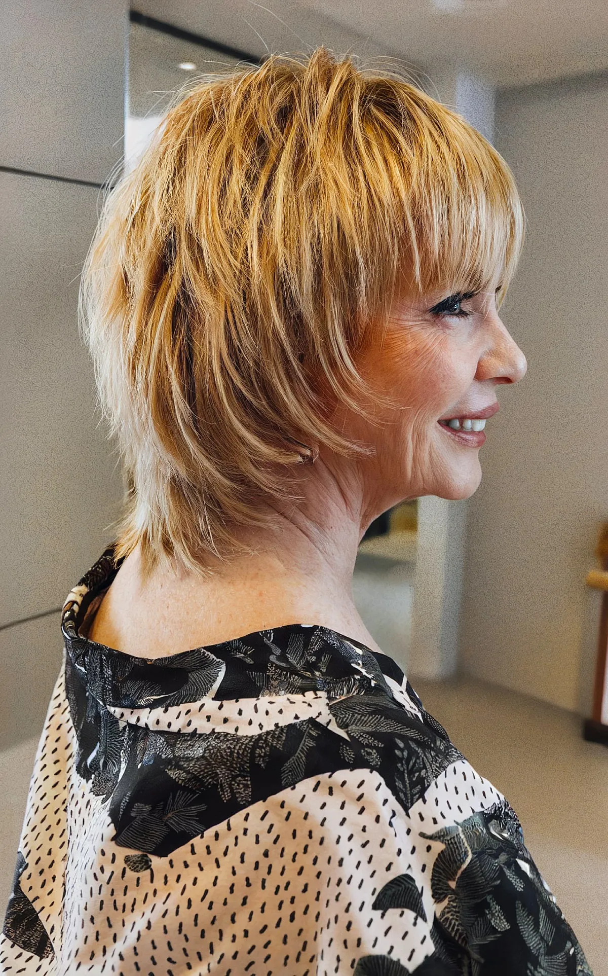 Sleek Mullet Shag Featuring Golden Blonde Tones for Women Over 70