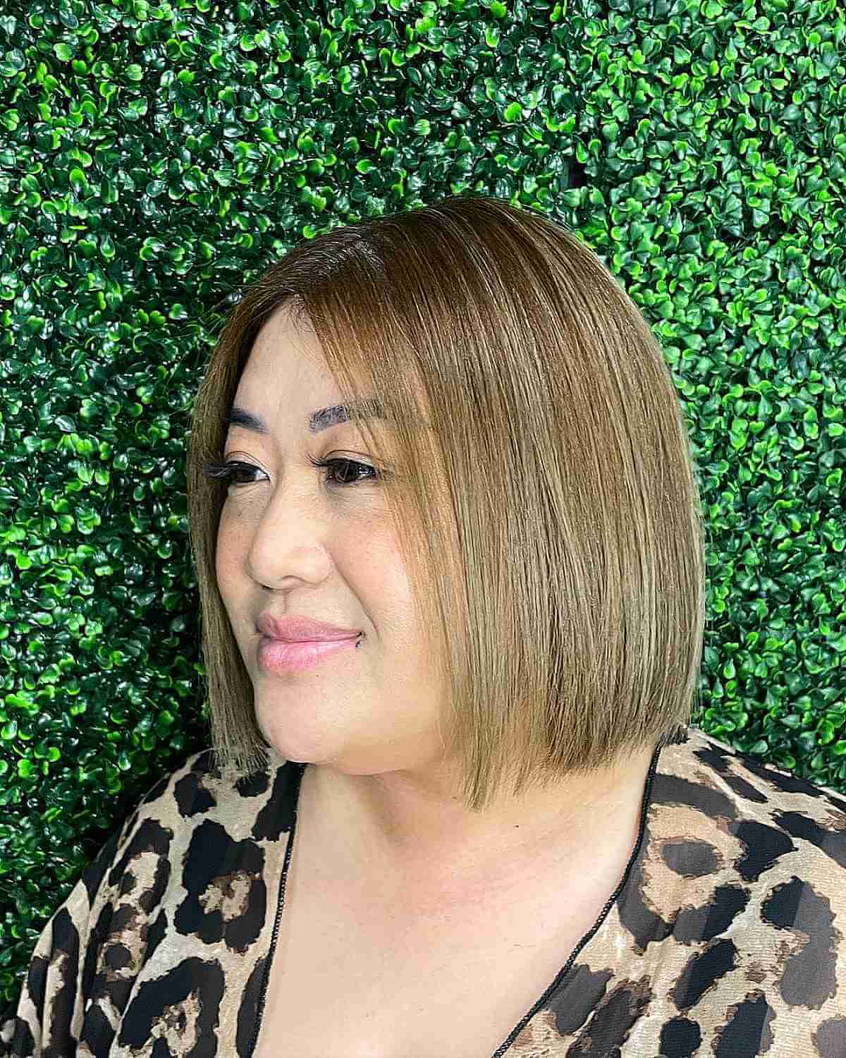 Sleek Neck-Length Haircut for Round Face Shapes