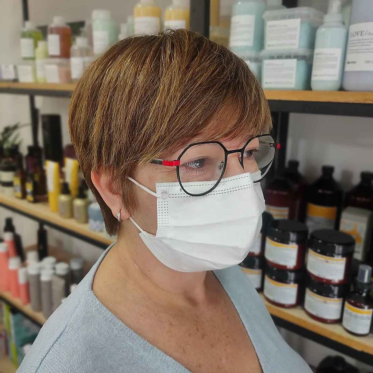 Sleek Pixie Cut with Brow-Grazing Bangs