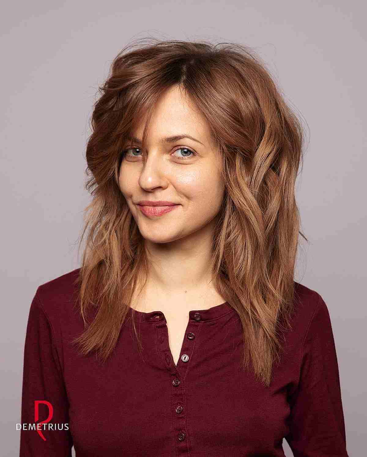 Sleek Layered Shag Haircut with Extended Side Bangs for Mid-Length Hair