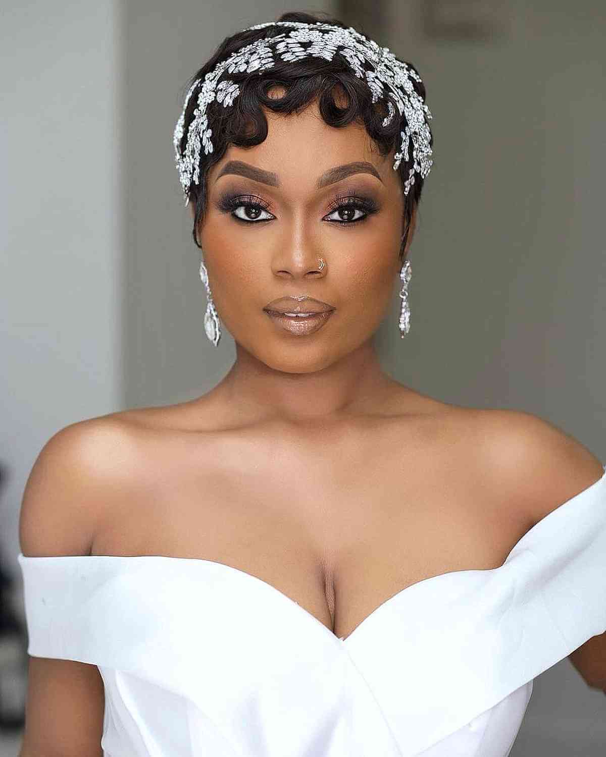 Sleek Short Curls Accompanied by a Stunning Headpiece for a Wedding