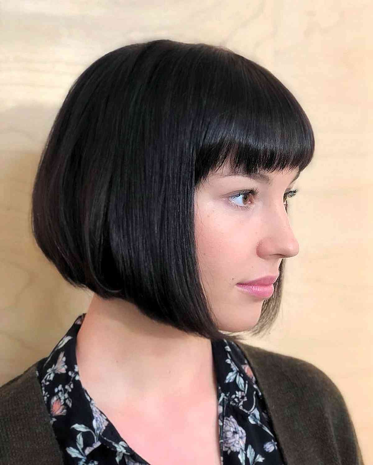 Sleek Straight Bob with Bangs at the Jawline