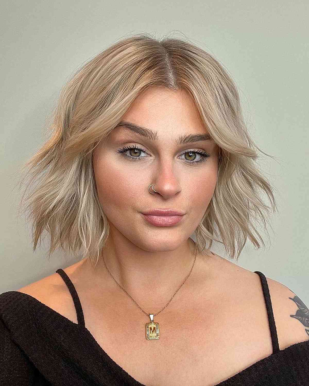 Smooth Creamy Blonde Choppy Razored Bob