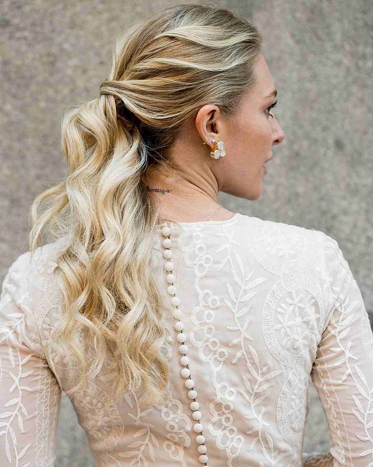 Smooth Low Ponytail with Soft Waves