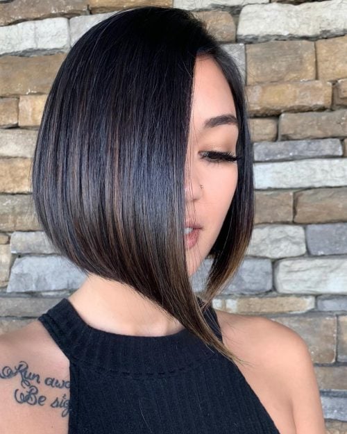 Smooth Short Hairstyle Featuring a Side Part