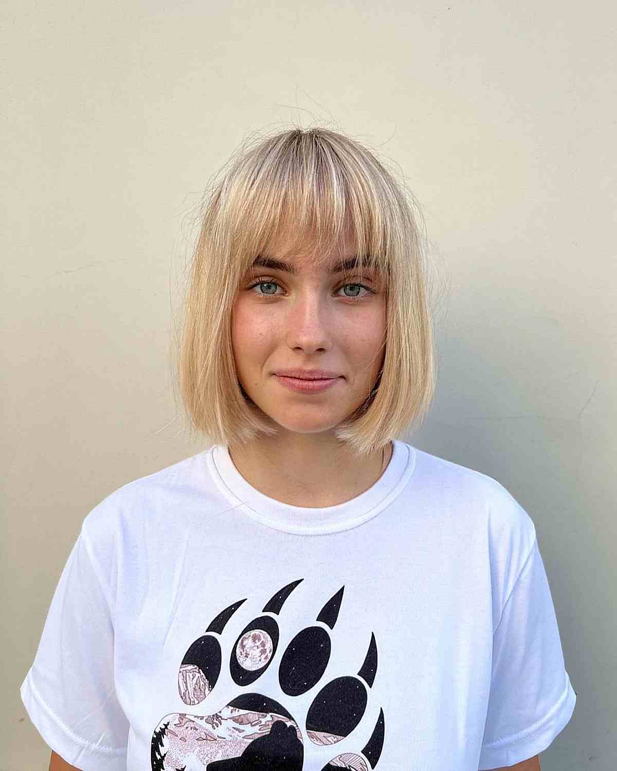 Soft Bangs on Timeless Blonde Bobbed Chin-Length Hair