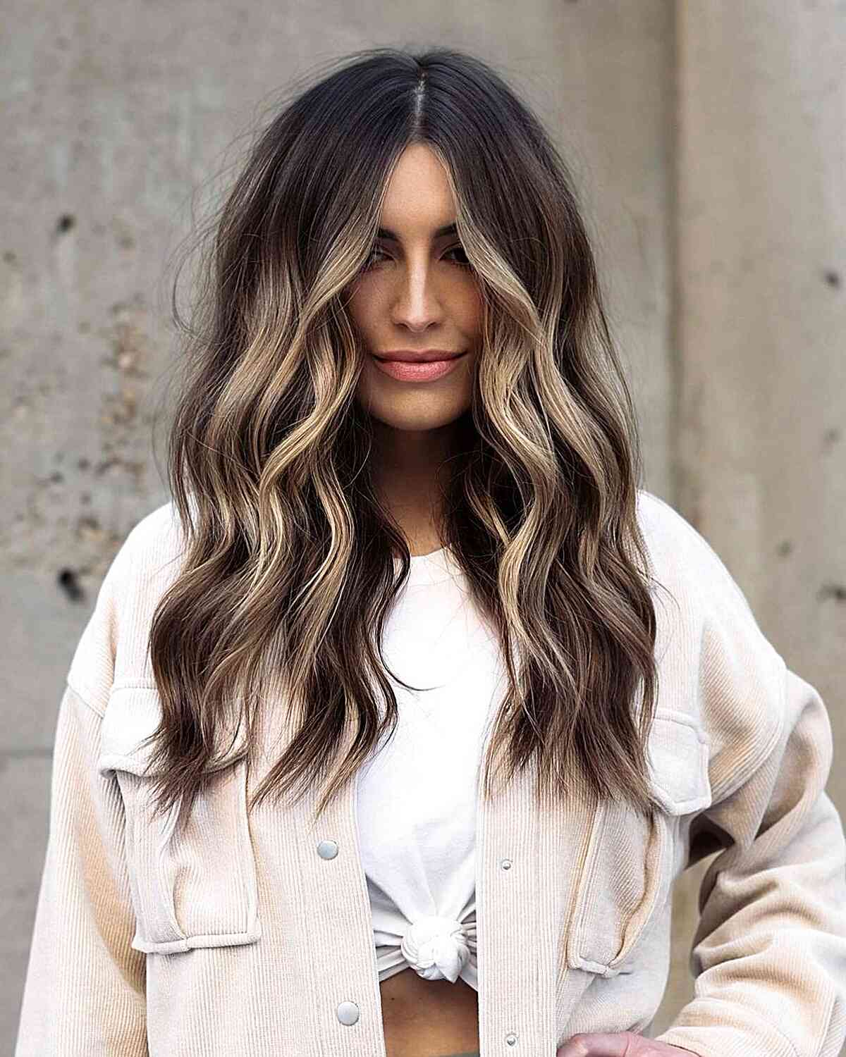 Soft Blonde Money Piece on Chest-Length Balayage Dark Brown Tresses with Middle Part