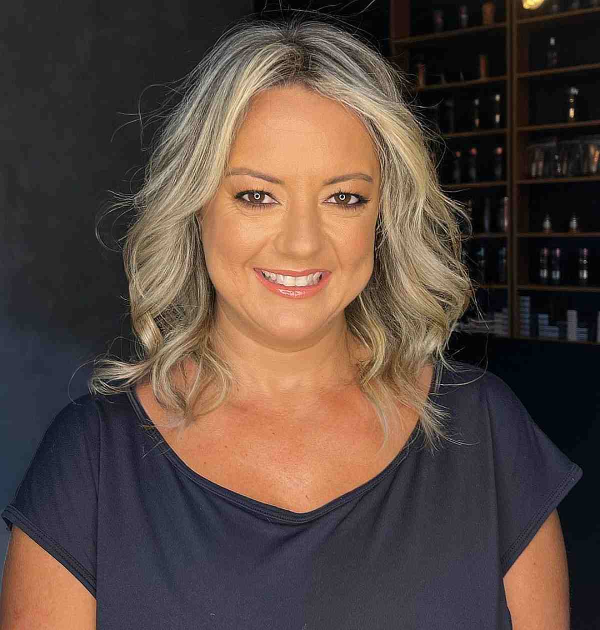 Mid-Length Soft Blonde Waves for Women Over 50