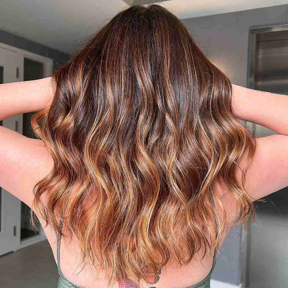 Soft Chocolate Brown Hair with Copper Balayage Gold Highlights