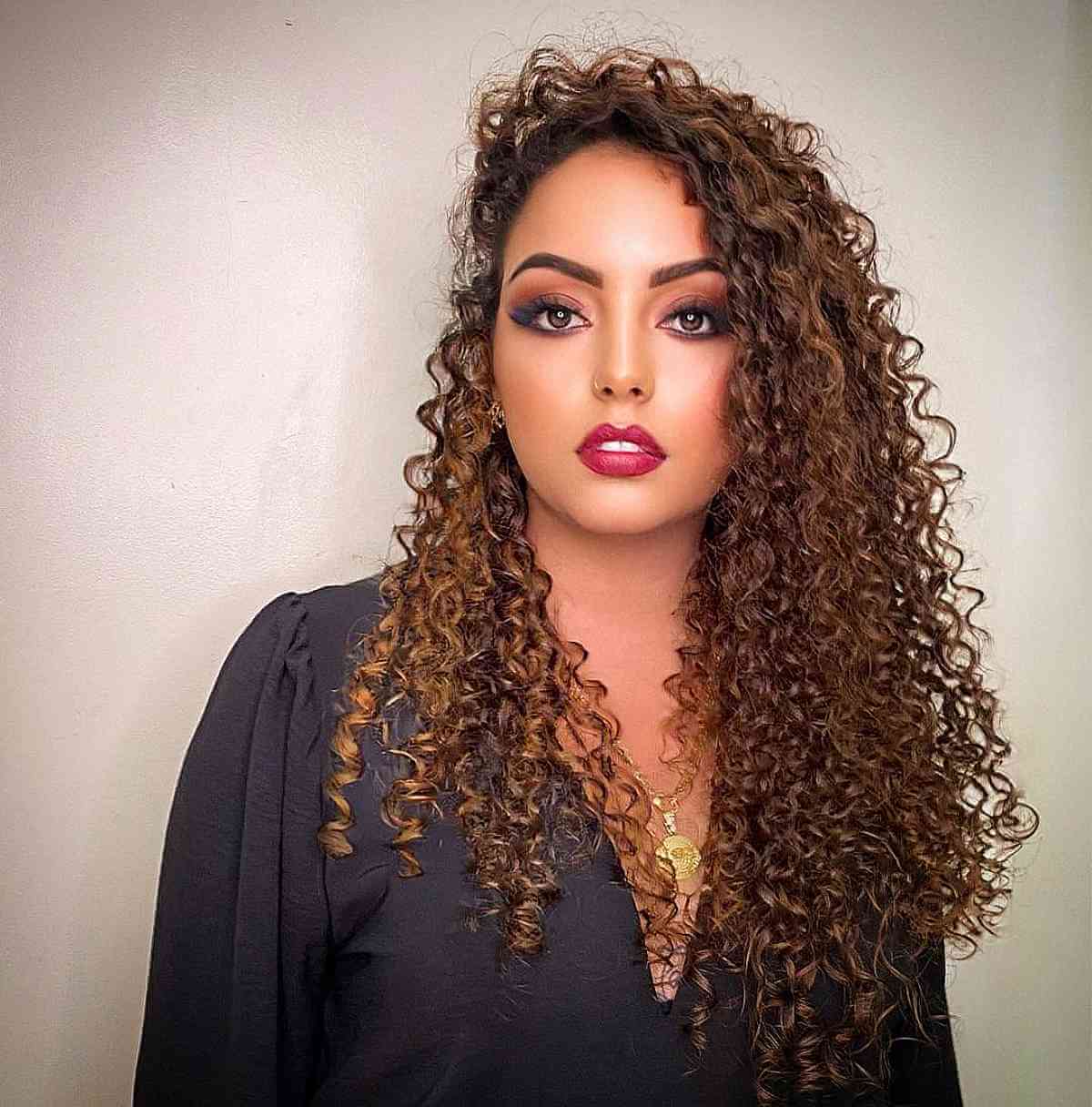 Long Soft Light Brown Curls with a Side Part