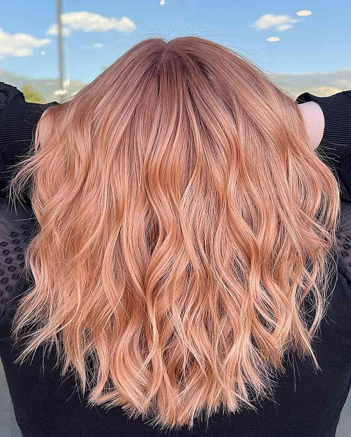 Soft Light Strawberry Blonde Copper with Medium-Length Textured Waves