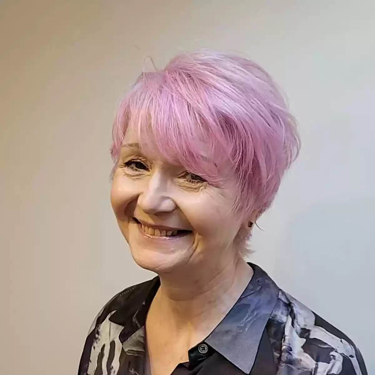 Soft Pink on Wispy Pixie Bob Hair for Older Women in Their 60s