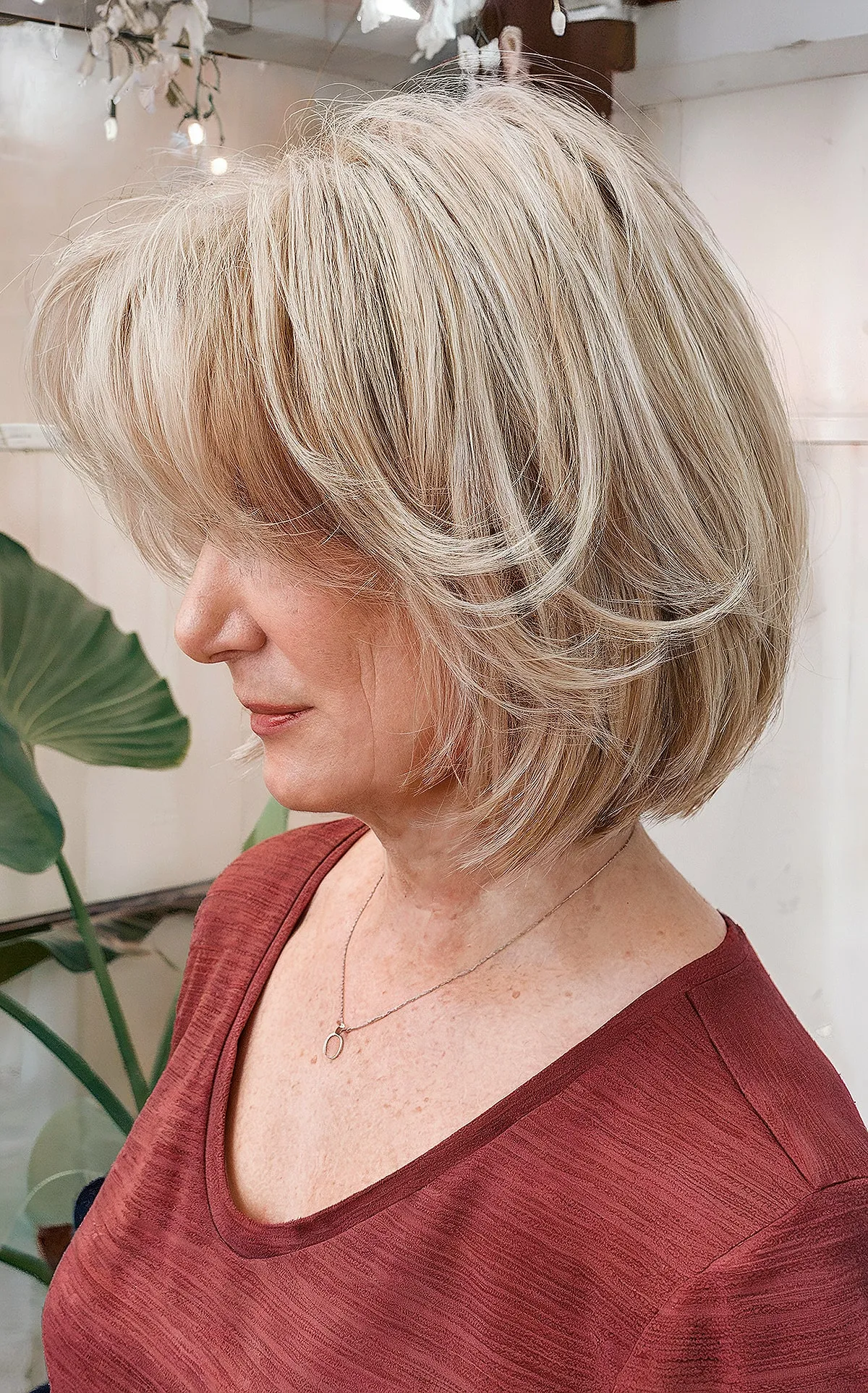 Short Platinum Wispy Bob with Layers and Bangs