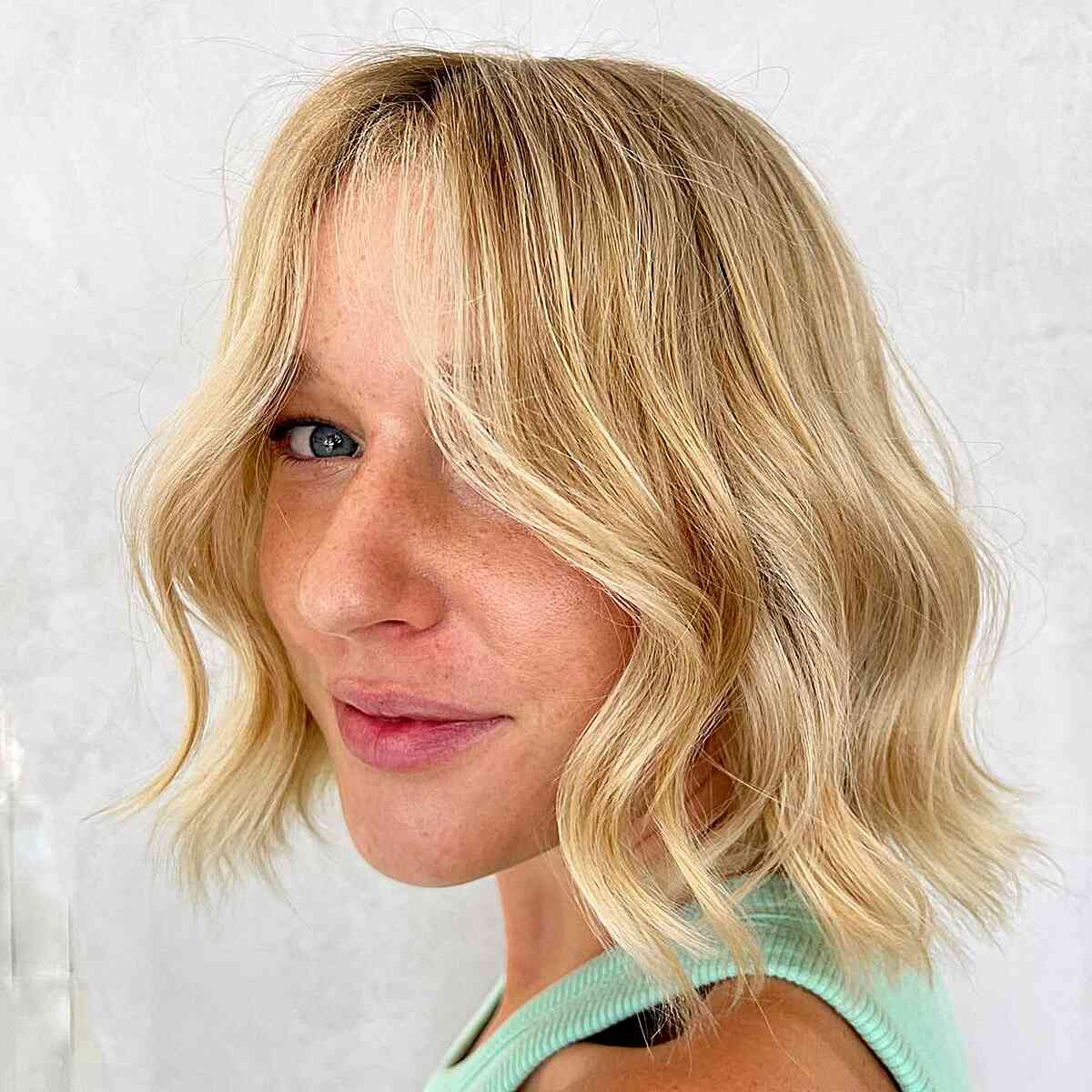 Short Soft Textured Light Golden Blonde Bob with Soft Dimension