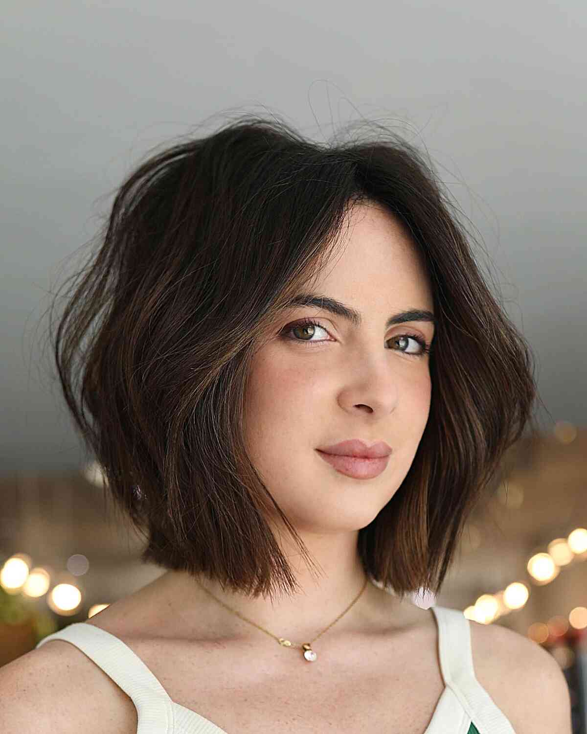 Soft Waves and Texture for Neck-Length Hair featuring dark brown hair