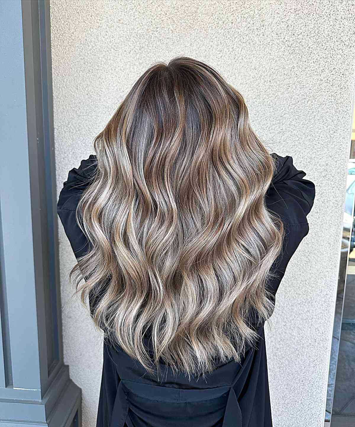 Long Softly Wavy Brown Hair with Subtle Champagne Blonde Highlights