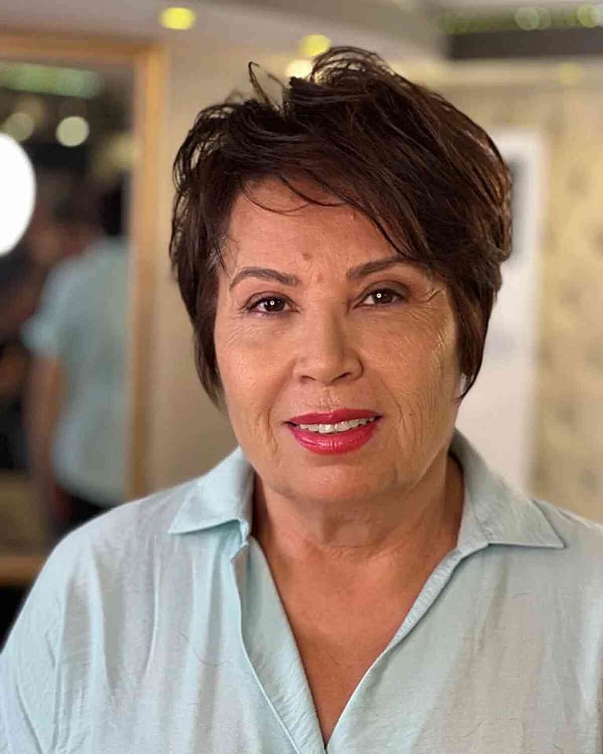 Sophisticated Dark Brown Long Pixie Hairstyle for 60-year-olds