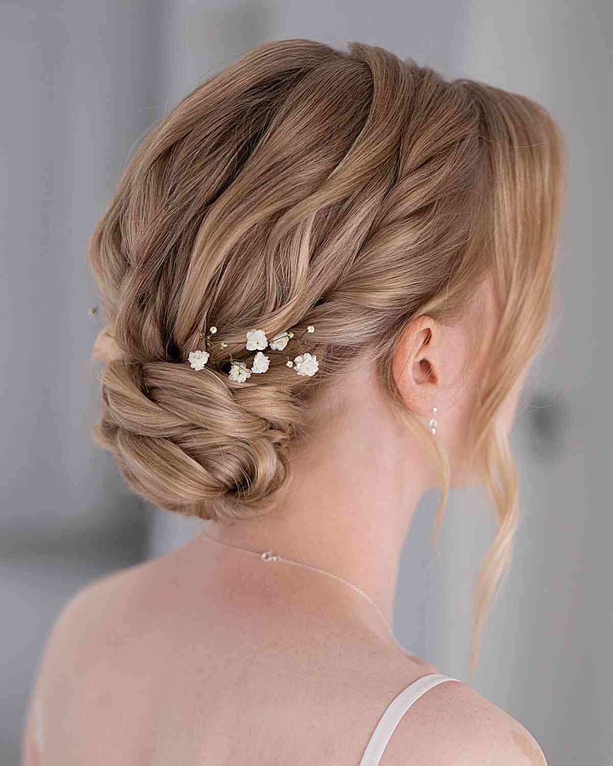 Sophisticated Side-Bun for a Romantic Evening on Short Hair
