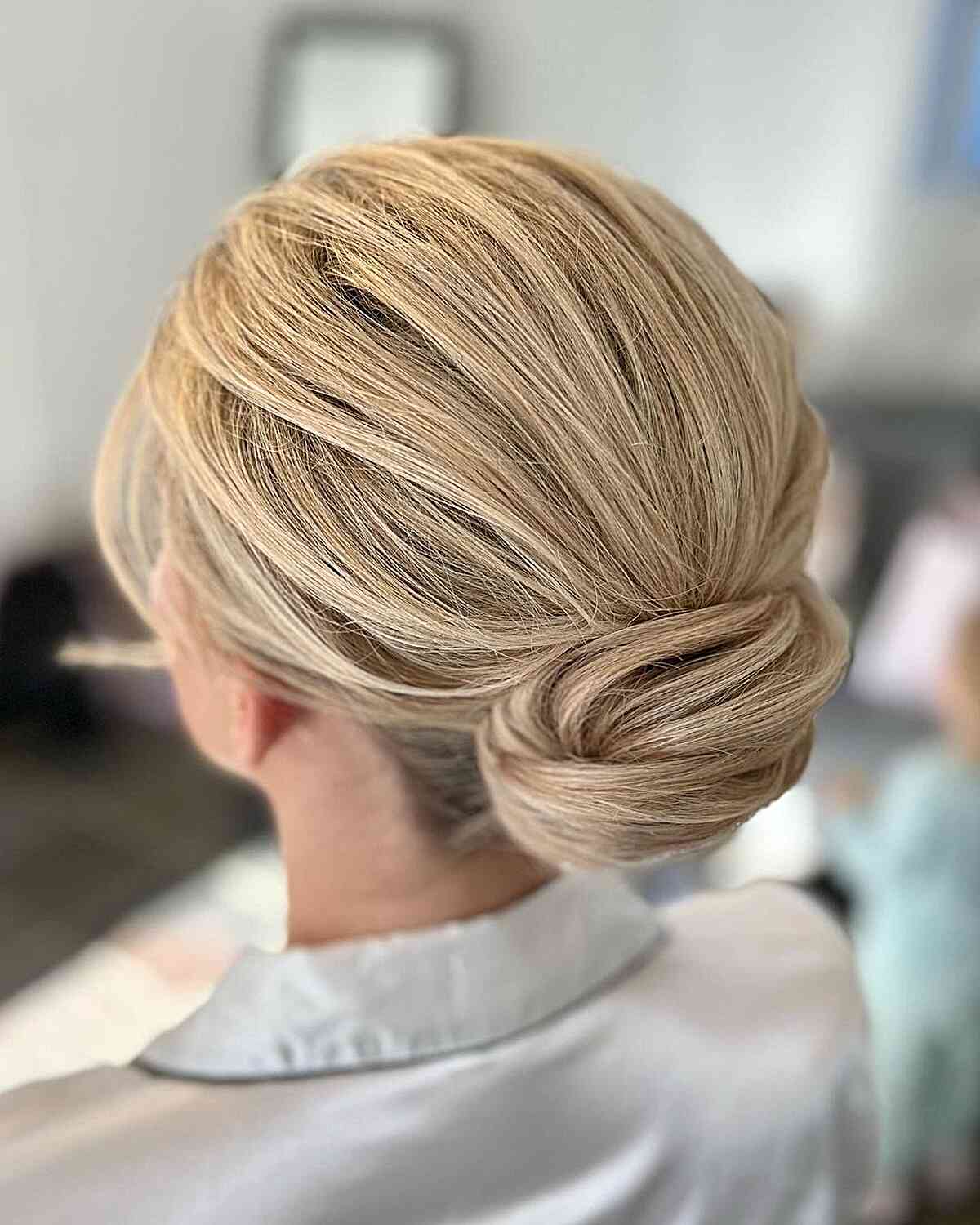 Sophisticated Twisted Bun Updo for Medium Hair