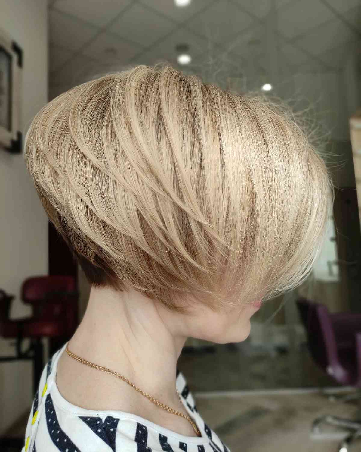 Stylish Short Haircut with Feathered Layers for Straight Hair