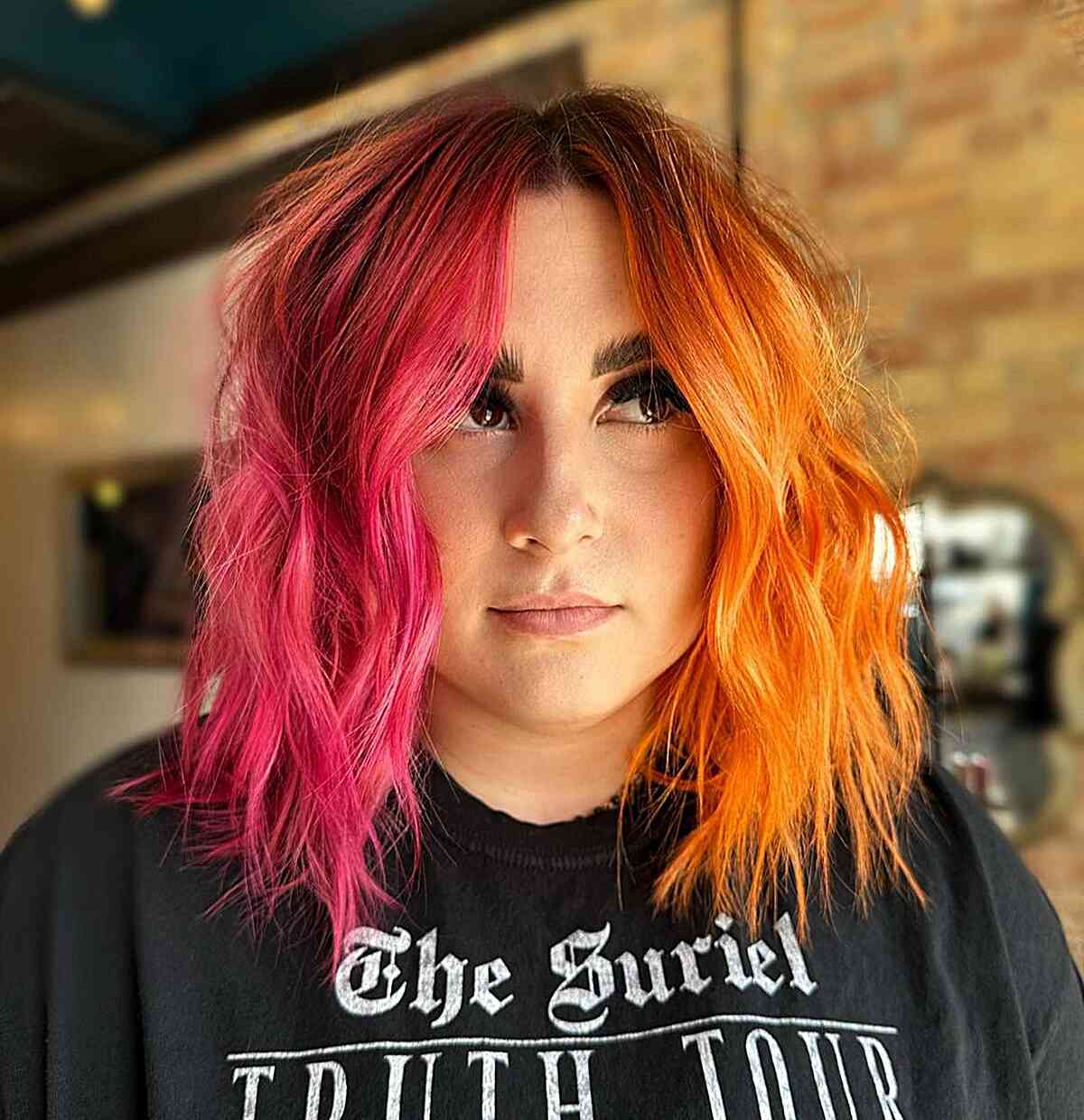 Split Pink and Orange Textured Hairstyle Hair Color Idea