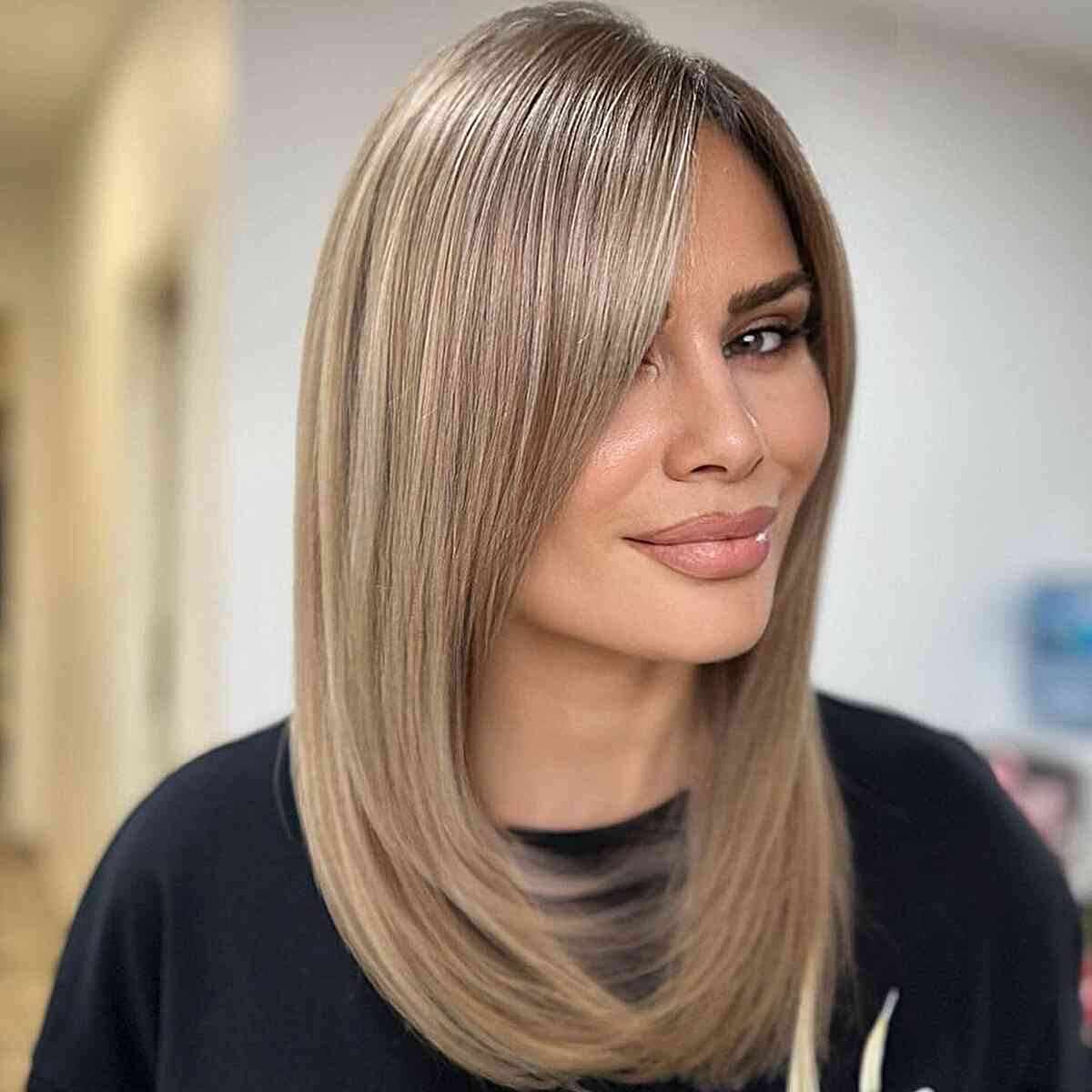 Stunning Balayage on Sleek Hair for women with a middle part