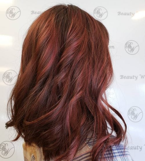 Stunning red highlights on brunette hair