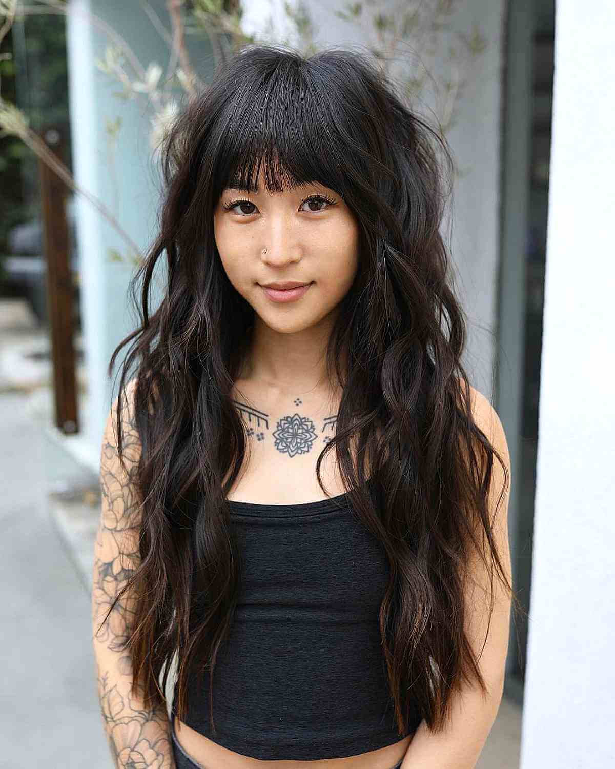 Stunning Long Layered Shag with Bangs for Voluminous Hair