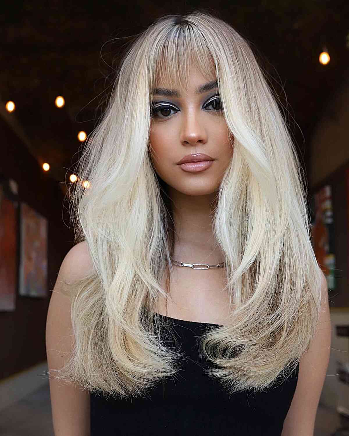 Stunning Long Straight Blonde Hair with Wispy Bangs for long faces