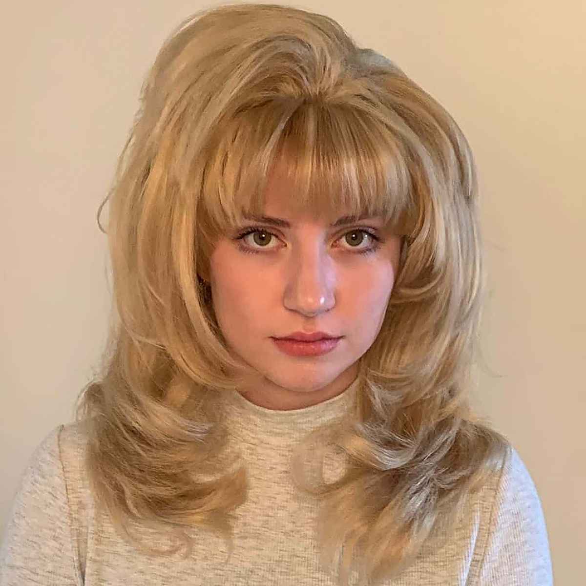 Stylish 80s Feathered Bangs Look