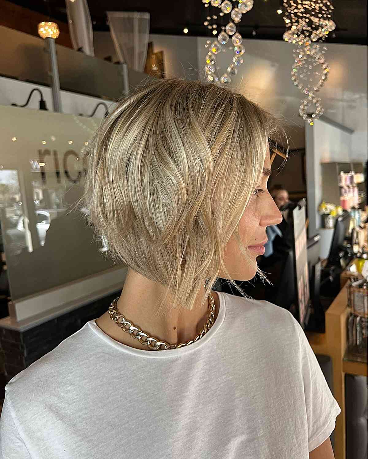 Chic Beige Blonde A-line Bob with Shadow Root and Wispy Layers for Fine Hair