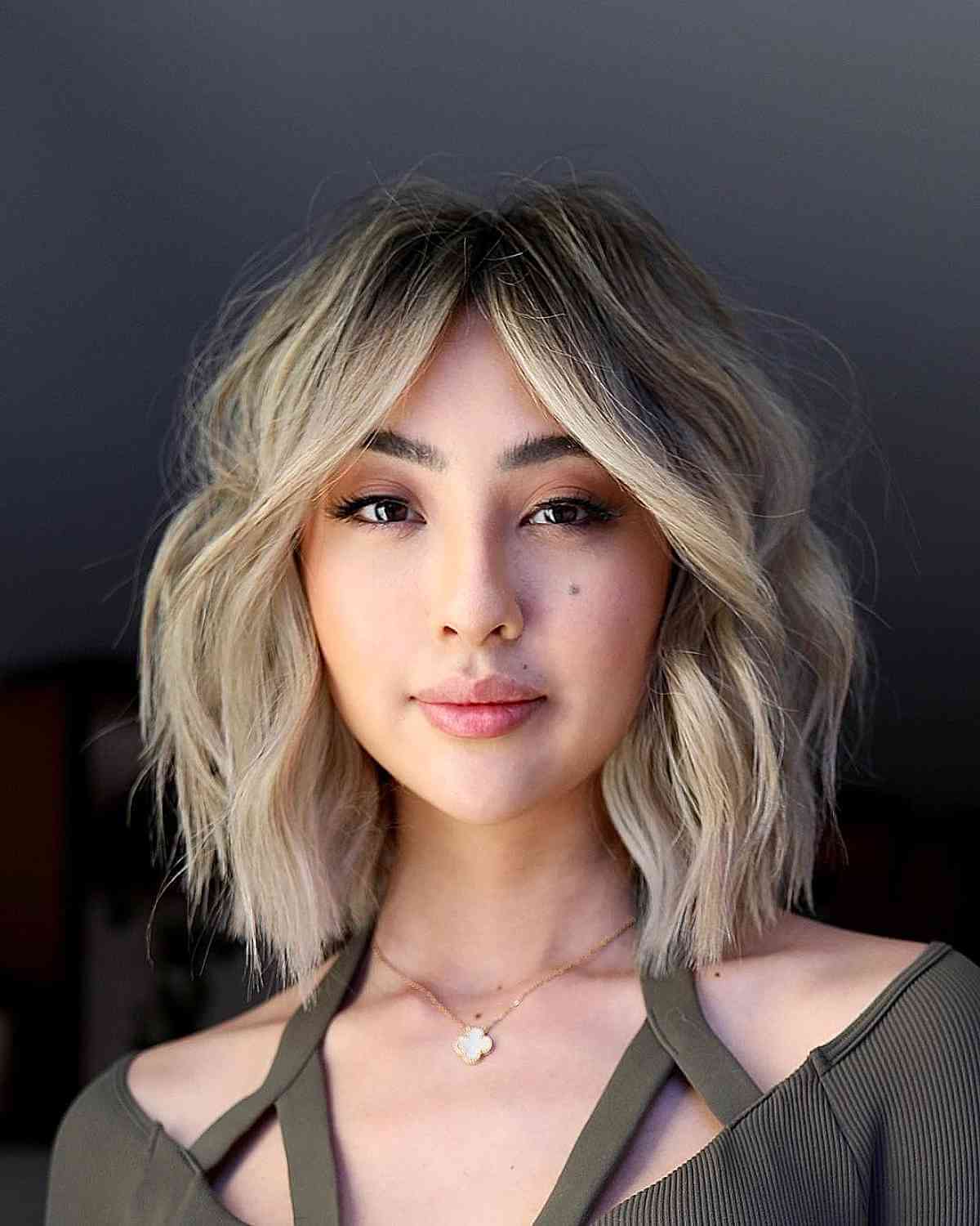 Stylish Blonde Blunt Lob with a Middle Part