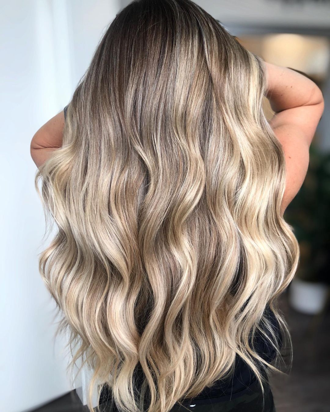 Chic Blonde Hair with Lowlights and Dark Roots