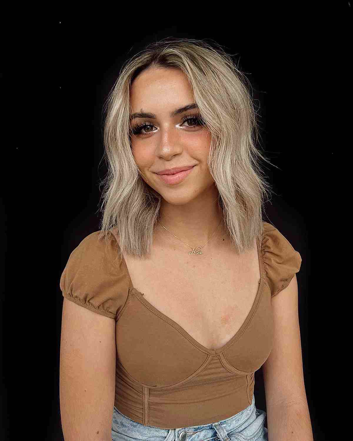 Shoulder-Length Center-Parted Razor Cut Bob for Fine Hair