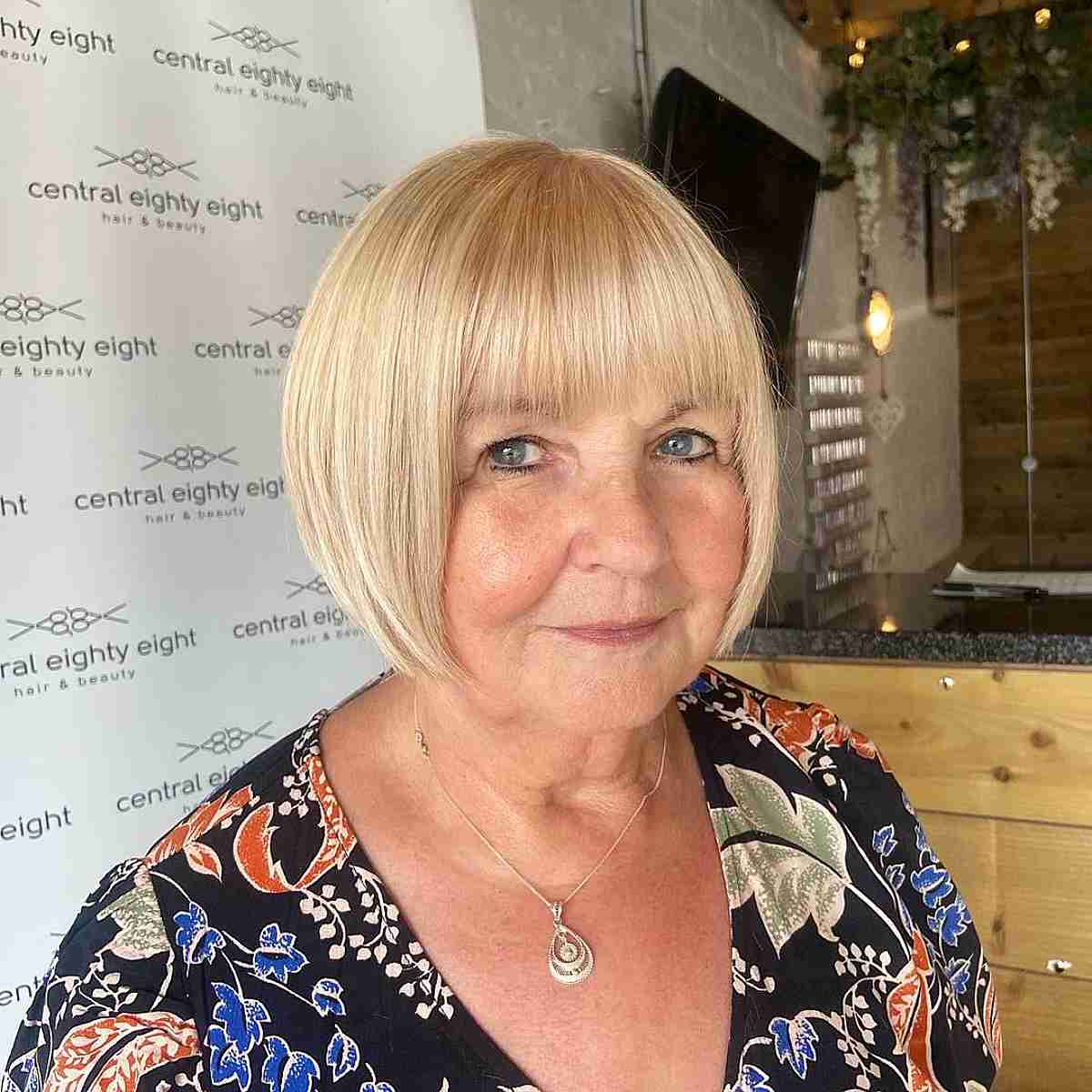 Stylish Short Chin-Length Blonde Bob Featuring Bangs