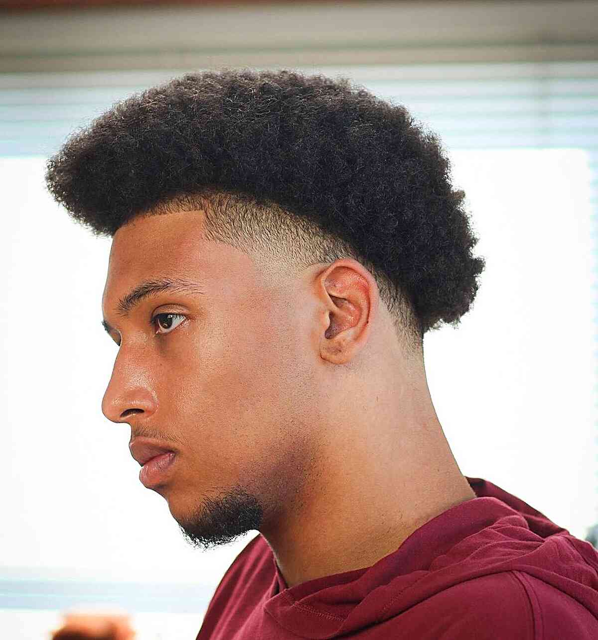 Stylish Dapper Fade for Black Men with thick curly hair