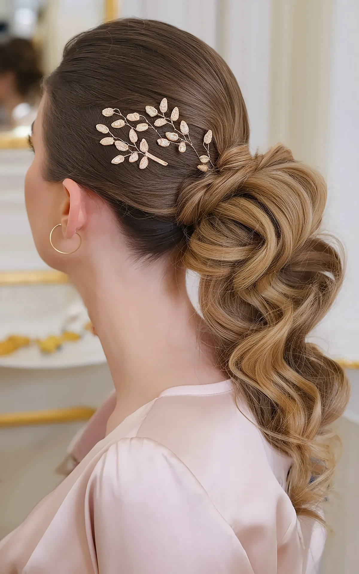Stylish Elevated Ponytail with Gentle Curls