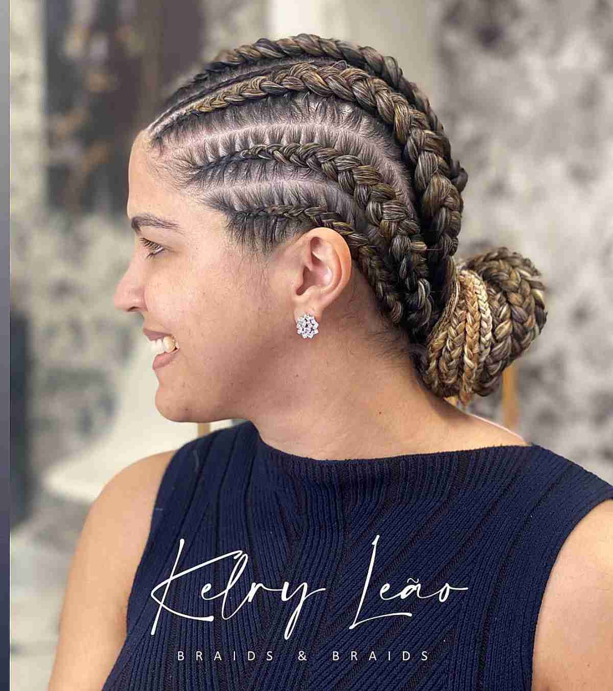 Stylish Ghana Braids Accompanied by a Low Bun