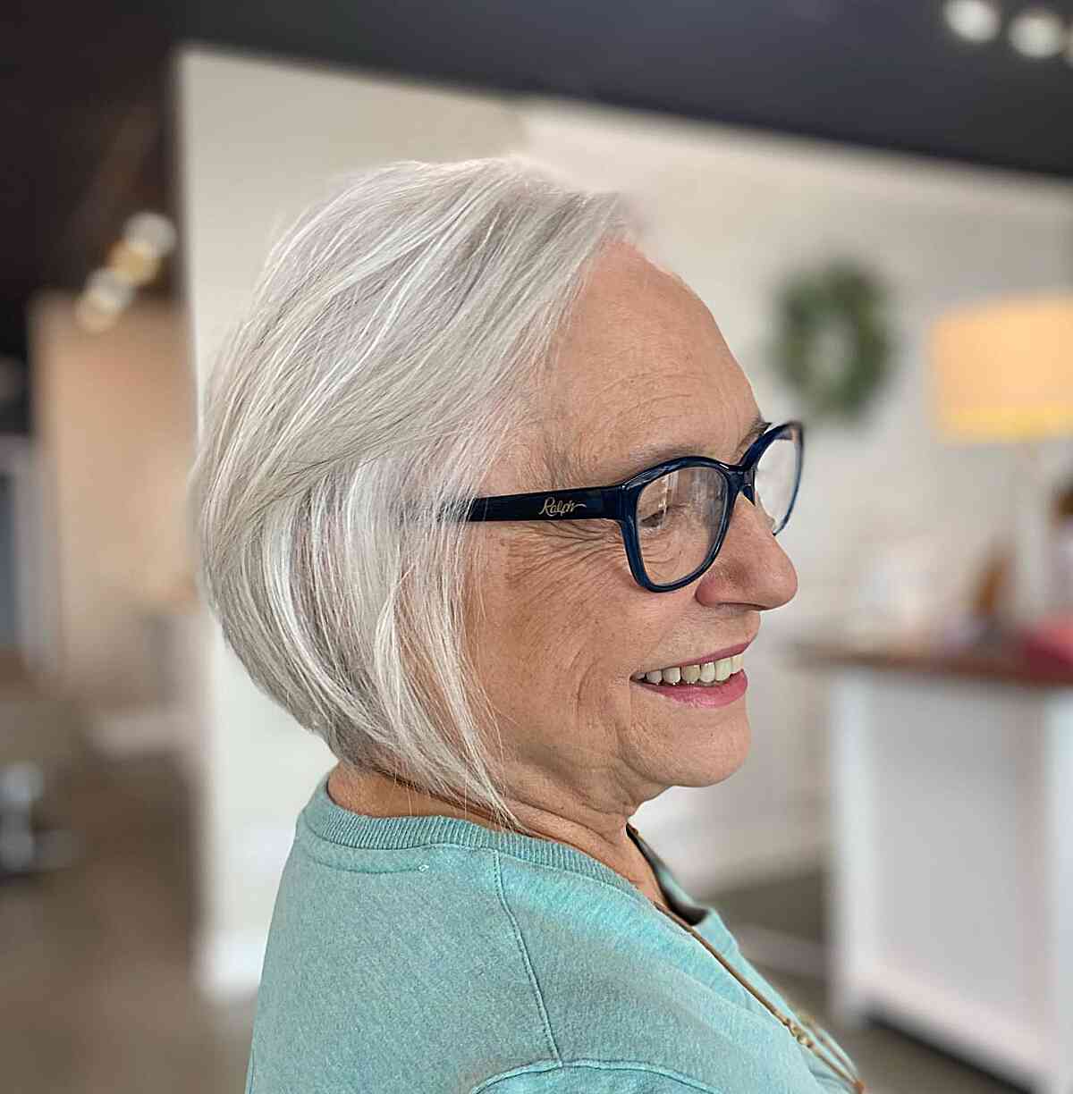 Stylish Gray Short Inverted Bob for Fine Hair on older ladies with glasses