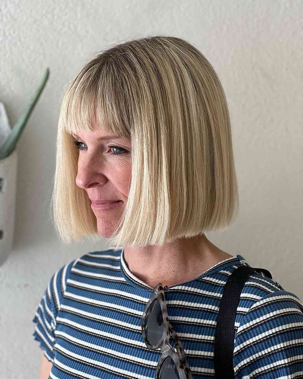 Stylish Long Blunt Bob with Full Bangs for Ladies Over 40
