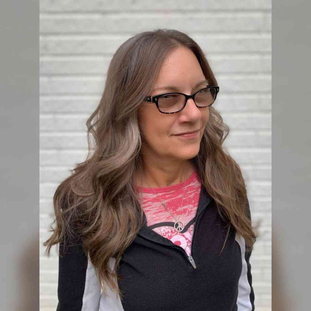 Stylish Long Hair for Women with Glasses in Their 40s